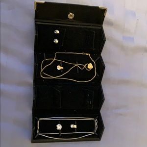 2 necklaces with 4 pendants and pair of earrings